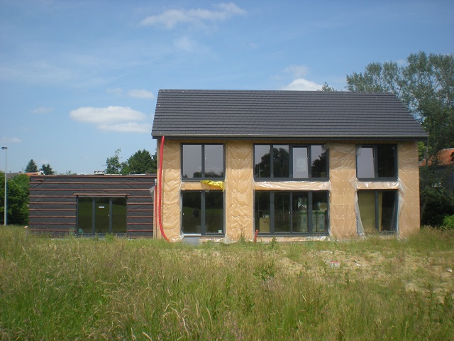 Image du projet Construction d'une maison passive & zéro-énergie en bois à Herve et un cabinet de kinésithérapie